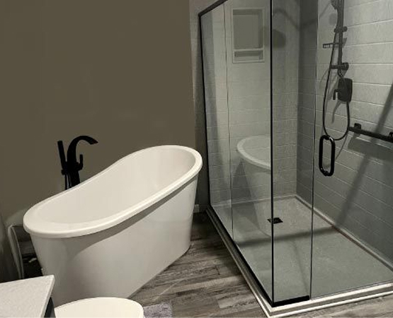 Remodeled basement bathroom with tub and shower