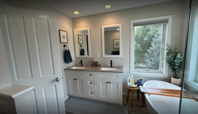 A clean modern bathroom with a freestanding tub