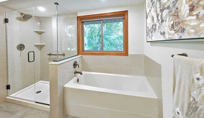 Modern master bathroom installation with shower and bathtub Newly installed master bathroom featuring a walk-in shower and freestanding bathtub