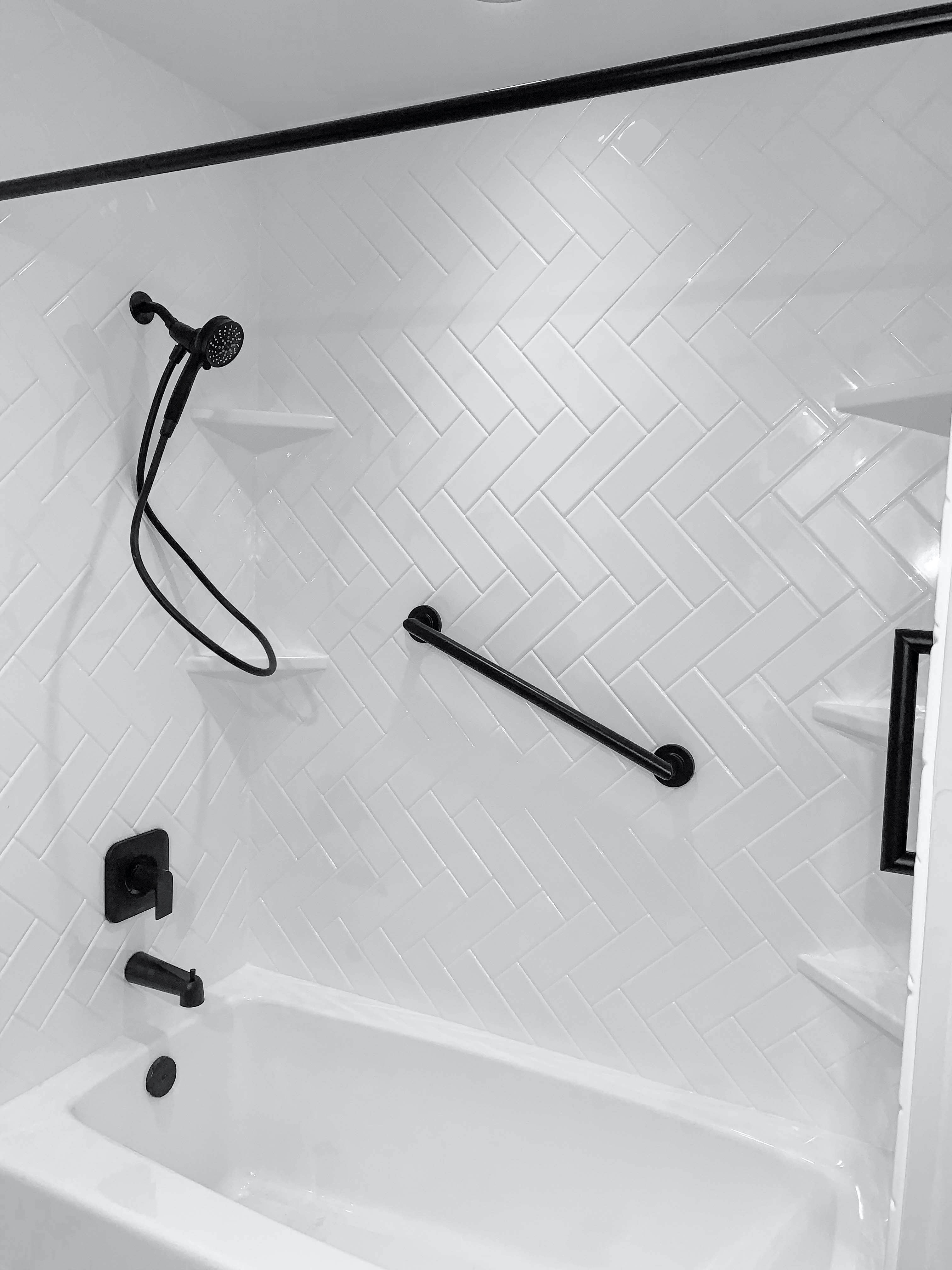 White Herringbone Tub/Shower Remodel in Little Canada