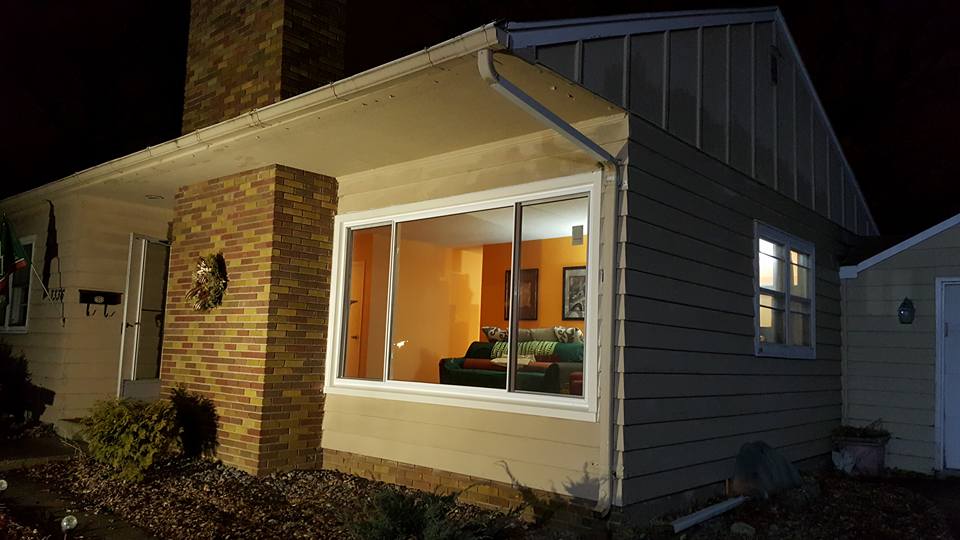 AFTER - A beautiful 3-lite Slider window was a great replacement.  It opens up the room and really allows the natural light into the home