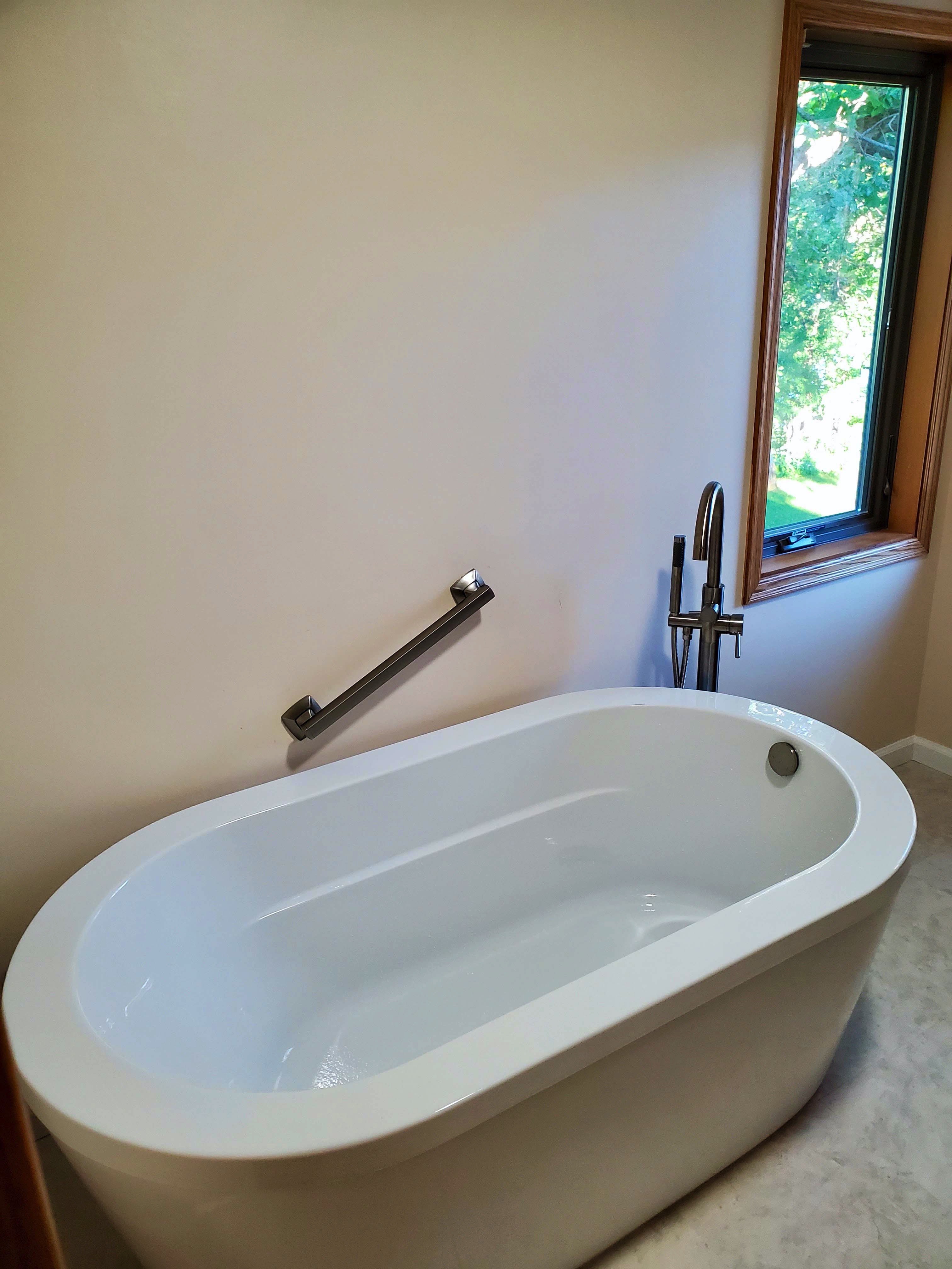 Freestanding Tub and Natural Stone Walk-in Shower Master Bathroom Remodel