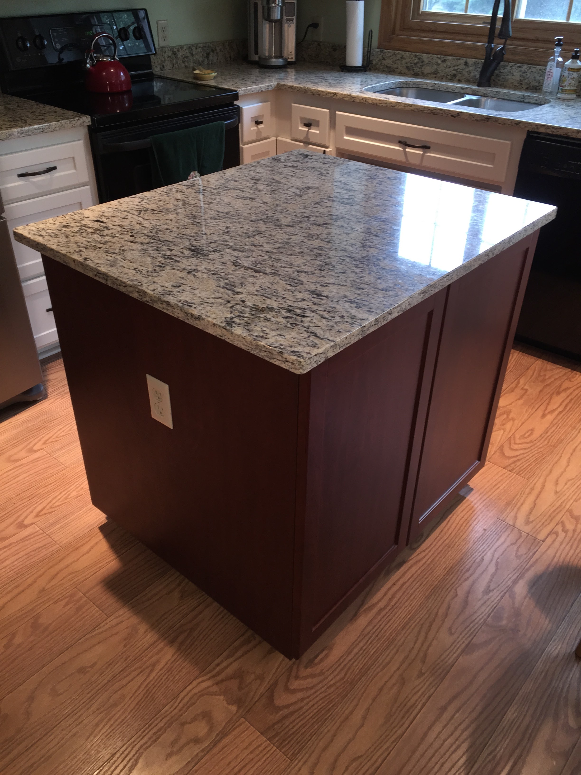 AFTER - New Kitchen Island with Tawney Port finish.  Selecting a contrasting color is a way to give some visual interest to the kitchen and a very modern feel.