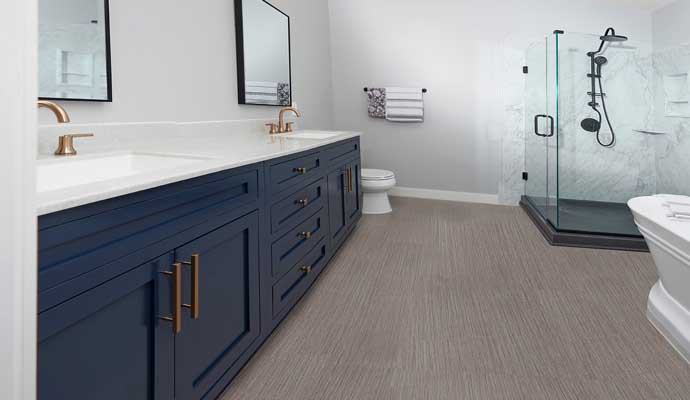 modern bathroom with vanity and golden faucets