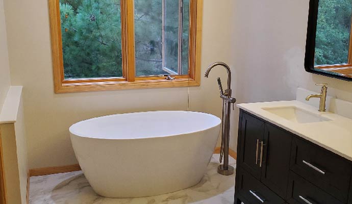 Modern bathroom freestanding tub window vanity