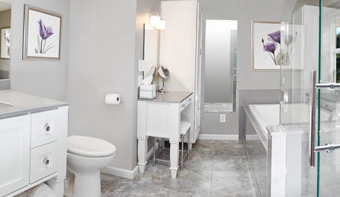 Modern bathroom interior with glass shower and bathtub