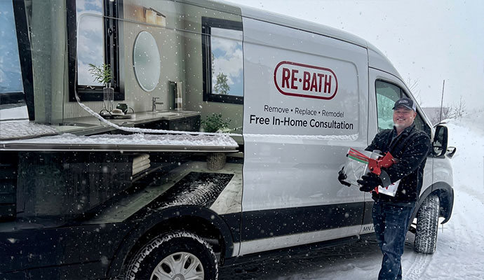 Rebath remodeling service van with technician