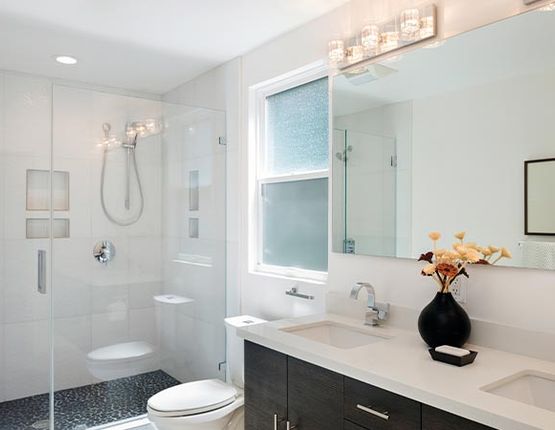 Stylish and smart bathroom design after remodeling Remodeled bathroom with with a clean, modern, and stylish interior
