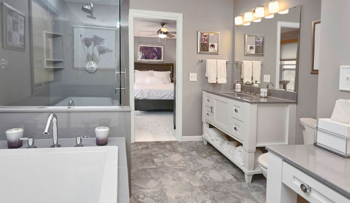 Modern bathroom design with tub and glass shower