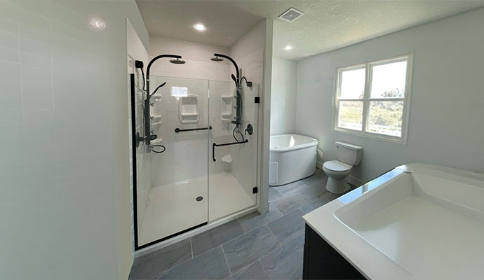 A shower with an installed shower enclosure