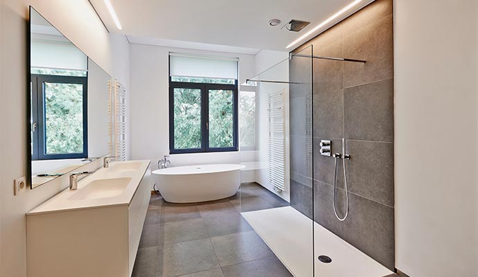 Upgraded modern bathroom with bathtub