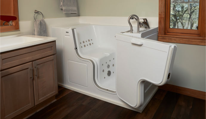 A bathroom featuring a walk-in bathtub